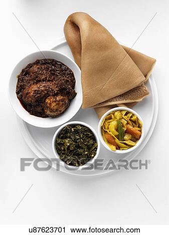 Stock Image - Ethiopian Christmas dinner. Fotosearch