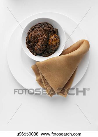 Stock Photo - Ethiopian Christmas dinner. Fotosearch