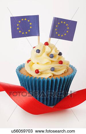 European Union Flag Cupcake With Buttercream Topping, In Blue Cake Case With Red Ribbon, White Background View Large Photo Image Stock Image - European Union Flag Cupcake With Buttercream Topping, In Blue Cake Case With Red Ribbon, White Background. Fotosearch