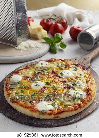Four cheeses pizza View Large Photo Image Stock Image - Four cheeses pizza. Fotosearch