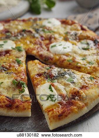 Four cheeses pizza View Large Photo Image Stock Image - Four cheeses pizza. Fotosearch