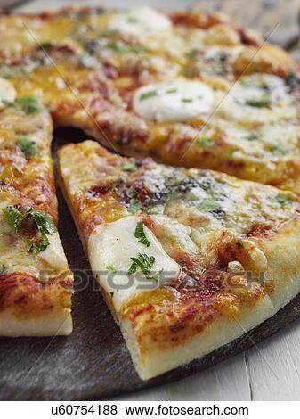 Four cheeses pizza View Large Photo Image Stock Photo - Four cheeses pizza. Fotosearch