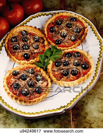 Four Mini Pastry Tartlets With Pizza Style Topping View Large Photo Image Stock Photo - Four Mini Pastry Tartlets With Pizza Style Topping. Fotosearch