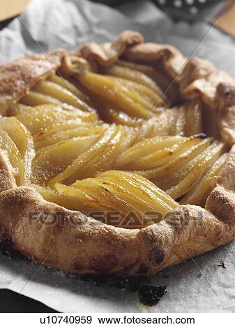 Stock Photo - Free form pear tart. Fotosearch
