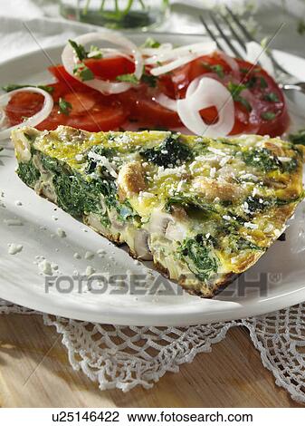 Frittata with mushrooms spinach onions and cashews View Large Photo Image Stock Image - Frittata with mushrooms spinach onions and cashews. Fotosearch
