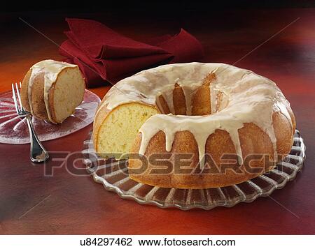 Glazed orange bundt cake View Large Photo Image Stock Image - Glazed orange bundt cake. Fotosearch