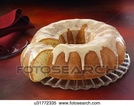 Glazed orange bundt cake View Large Photo Image Stock Photography - Glazed orange bundt cake. Fotosearch