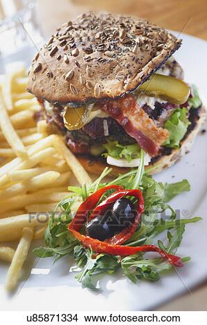 Gourmet Burger Served With Fries View Large Photo Image Picture - Gourmet Burger Served With Fries. Fotosearch