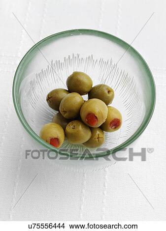 Green olives stuffed with pimientos View Large Photo Image Picture - Green olives stuffed with pimientos. Fotosearch