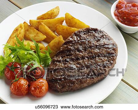 Grilled steak wedges and tomatoes View Large Photo Image Stock Image - Grilled steak wedges and tomatoes. Fotosearch