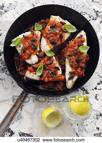 Halibut frying in a pan View Large Photo Image Stock Image - Halibut frying in a pan. Fotosearch