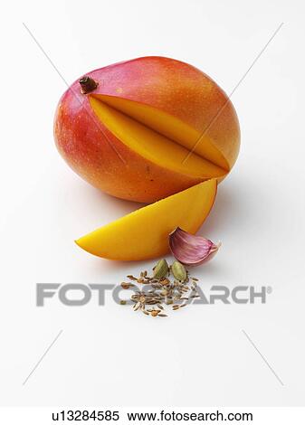 Honey mango with garlic cardomon fennel fenugreek cumin View Large Photo Image Stock Photography - Honey mango with garlic cardomon fennel fenugreek cumin. Fotosearch
