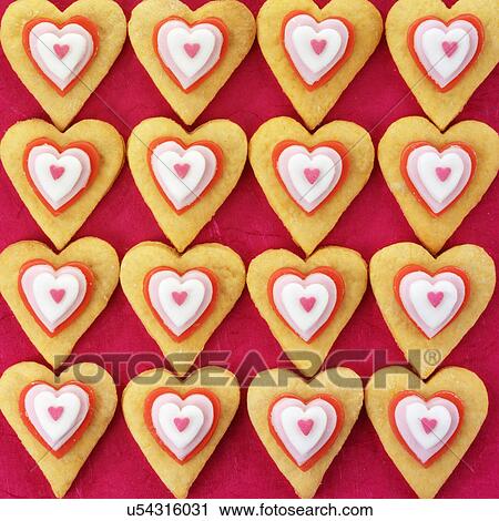 Iced Heart Shaped Biscuits Or Cookies On Red View Large Photo Image Stock Image - Iced Heart Shaped Biscuits Or Cookies On Red. Fotosearch