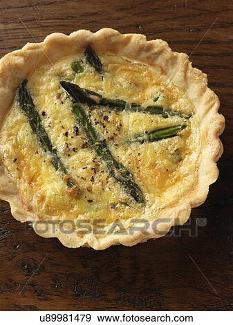Individual asparagus and pea tart View Large Photo Image Stock Photo - Individual asparagus and pea tart. Fotosearch