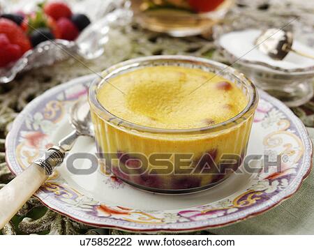 Individual blueberry clafoutis on a garden table View Large Photo Image Stock Image - Individual blueberry clafoutis on a garden table. Fotosearch