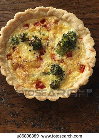 Individual broccoli and red pepper tart View Large Photo Image Stock Photo - Individual broccoli and red pepper tart. Fotosearch