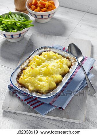 Individual cottage pie gluten free View Large Photo Image Stock Photo - Individual cottage pie gluten free. Fotosearch