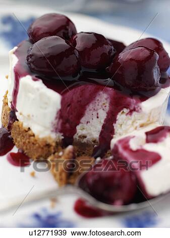 Individual gluten free cherry cheesecake on an antique plate View Large Photo Image Stock Photo - Individual gluten free cherry cheesecake on an antique plate. Fotosearch