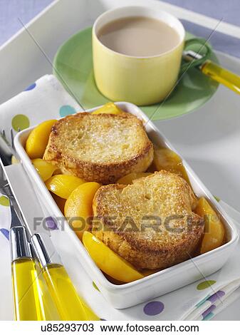 Stock Image - Individual portion of peach cobbler. Fotosearch