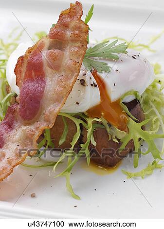 Individual portion of salad Lyonnais View Large Photo Image Stock Image - Individual portion of salad Lyonnais. Fotosearch
