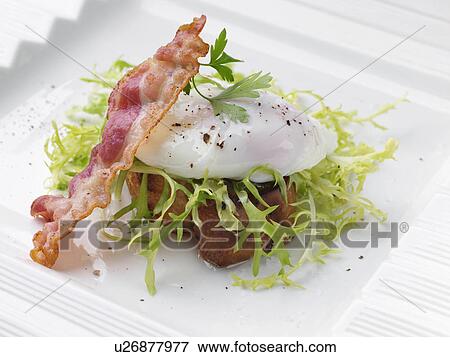 Individual portion of salad Lyonnais View Large Photo Image Stock Photo - Individual portion of salad Lyonnais. Fotosearch