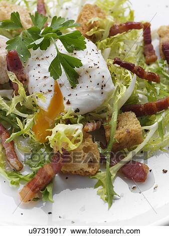 Individual portion of salad Lyonnais View Large Photo Image Stock Photo - Individual portion of salad Lyonnais. Fotosearch