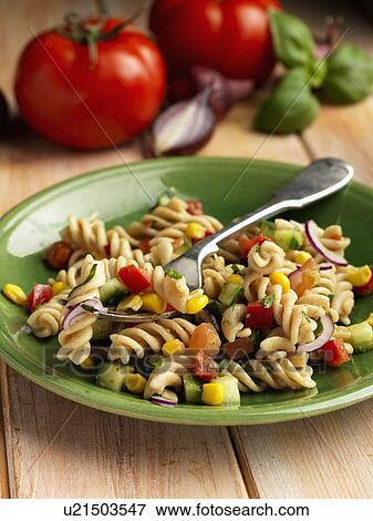 Individual portion of vegetarian pasta salad View Large Photo Image Stock Photo - Individual portion of vegetarian pasta salad. Fotosearch