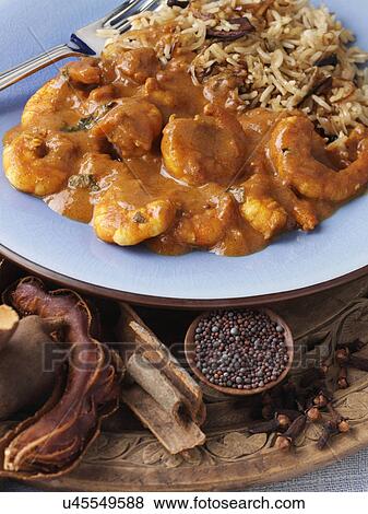 King prawn keralan curry with brown rice View Large Photo Image Stock Photo - King prawn keralan curry with brown rice. Fotosearch