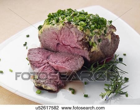 Lamb rump with a herb crust View Large Photo Image Stock Image - Lamb rump with a herb crust. Fotosearch