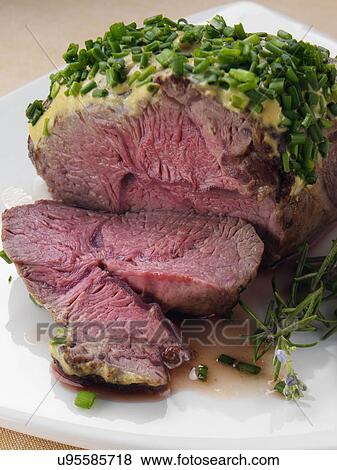 Lamb rump with a herb crust View Large Photo Image Stock Photo - Lamb rump with a herb crust. Fotosearch