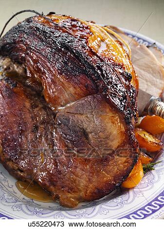 Leg of pork whole rolled boned glazed joint View Large Photo Image Stock Image - Leg of pork whole rolled boned glazed joint. Fotosearch