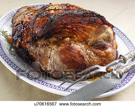 Leg of pork whole rolled boned glazed joint View Large Photo Image Stock Photo - Leg of pork whole rolled boned glazed joint. Fotosearch