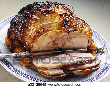 Leg of pork whole rolled boned glazed joint View Large Photo Image Stock Photography - Leg of pork whole rolled boned glazed joint. Fotosearch