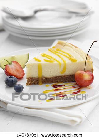 Lemon cheesecake slice View Large Photo Image Stock Image - Lemon cheesecake slice. Fotosearch
