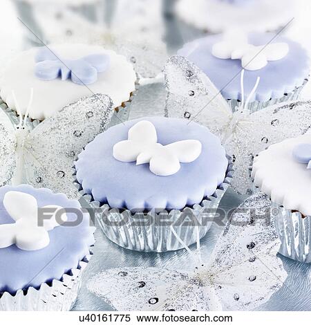 Lilac And White Iced Cupcakes With Butterfly Decorations Silver