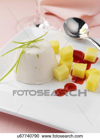 Lime and coconut panna cotta with raspberry coulis and mango pieces lactose and gluten free View Large Photo Image Stock Image - Lime and coconut panna cotta with raspberry coulis and mango pieces lactose and gluten free. Fotosearch