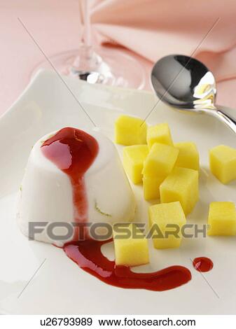 Lime and coconut panna cotta with raspberry coulis and mango pieces lactose and gluten free View Large Photo Image Stock Photo - Lime and coconut panna cotta with raspberry coulis and mango pieces lactose and gluten free. Fotosearch