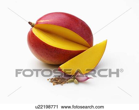 Stock Image - Mango garlic cardonoms fenugreek fennel cumin. Fotosearch