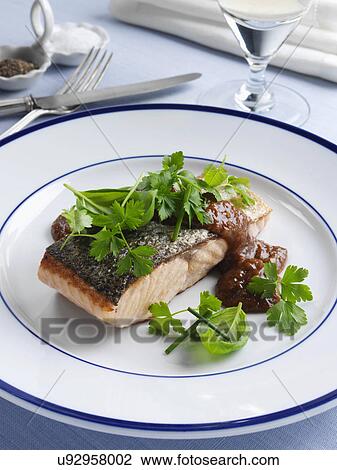 Marco Pierre White recipe salmon fillet with tomato sauce and herbs View Large Photo Image Stock Image - Marco Pierre White recipe salmon fillet with tomato sauce and herbs. Fotosearch