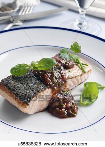 Marco Pierre White recipe salmon fillet with tomato sauce and herbs View Large Photo Image Stock Photo - Marco Pierre White recipe salmon fillet with tomato sauce and herbs. Fotosearch