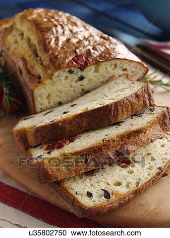 Stock Image - Mediterranean loaf sliced. Fotosearch