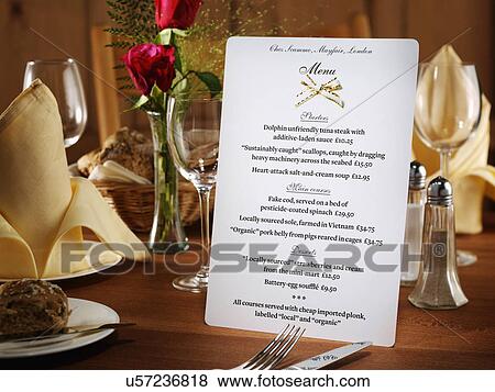 Menu in restaurant table setting View Large Photo Image Stock Photo - Menu in restaurant table setting. Fotosearch