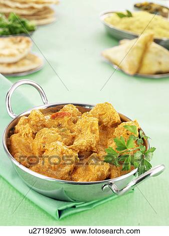 Metal Dish With Chicen Korma, Green Tabletop With Naan Bread, Rice And Samosas View Large Photo Image Stock Photography - Metal Dish With Chicen Korma, Green Tabletop With Naan Bread, Rice And Samosas. Fotosearch