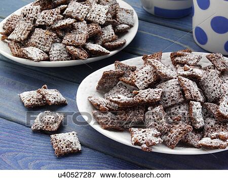 Stock Photo - Muddy buddy mix American crunchy snack. Fotosearch