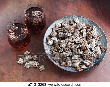 Stock Photo - Muddy buddy mix American crunchy snack. Fotosearch