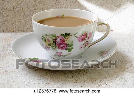 One Cup Of Tea With Milk In Pink And Green Floral White China Tea Cup And Saucer View Large Photo Image Stock Photo - One Cup Of Tea With Milk In Pink And Green Floral White China Tea Cup And Saucer. Fotosearch