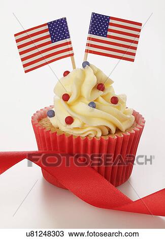 One Cupcake In Red Cake Case With Buttercream Topping And Decorated With Sprinkles And Two Small American Flags, On White Background With Red Ribbon View Large Photo Image Stock Image - One Cupcake In Red Cake Case With Buttercream Topping And Decorated With Sprinkles And Two Small American Flags, On White Background With Red Ribbon. Fotosearch