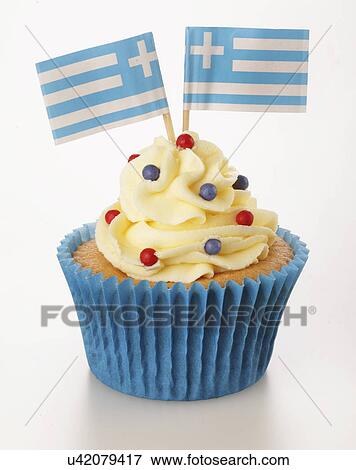 One Cupcake With Buttercream Topping Decorated With Two Greek Flags, Blue Cake Case, On White View Large Photo Image Stock Photo - One Cupcake With Buttercream Topping Decorated With Two Greek Flags, Blue Cake Case, On White. Fotosearch