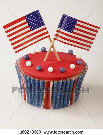 One Red Iced Cupcake Decorated With Two Small American Flags, White Background View Large Photo Image Stock Image - One Red Iced Cupcake Decorated With Two Small American Flags, White Background. Fotosearch