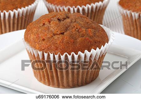 One Whoe Carrot Muffin On White Plate View Large Photo Image Stock Photograph - One Whoe Carrot Muffin On White Plate. Fotosearch
